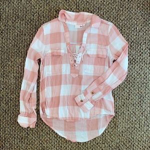 Pink and white pullover flannel